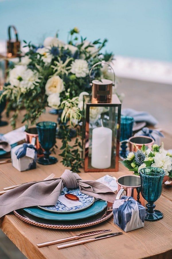 indigo blue and copper wedding table setting
