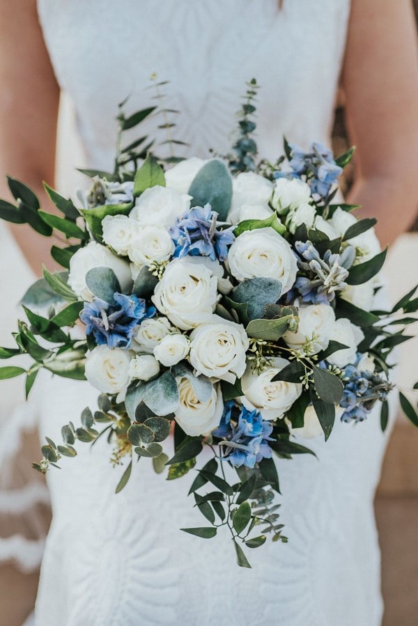 light blue and green eucalyptus and white roses wedding bouquet