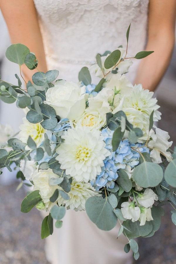 light blue and white flowers with eucalyptus wedding bouquet
