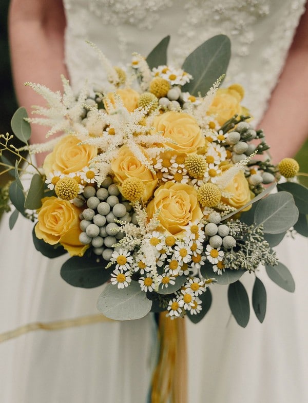 seeded eucalyptus and yellow roses wedding bouquet