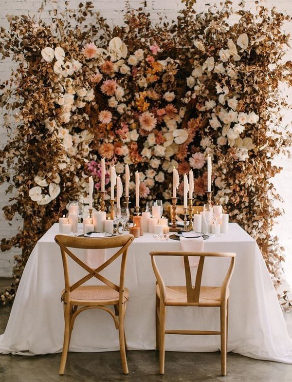 floral wedding backdrop will have you dreaming of fall