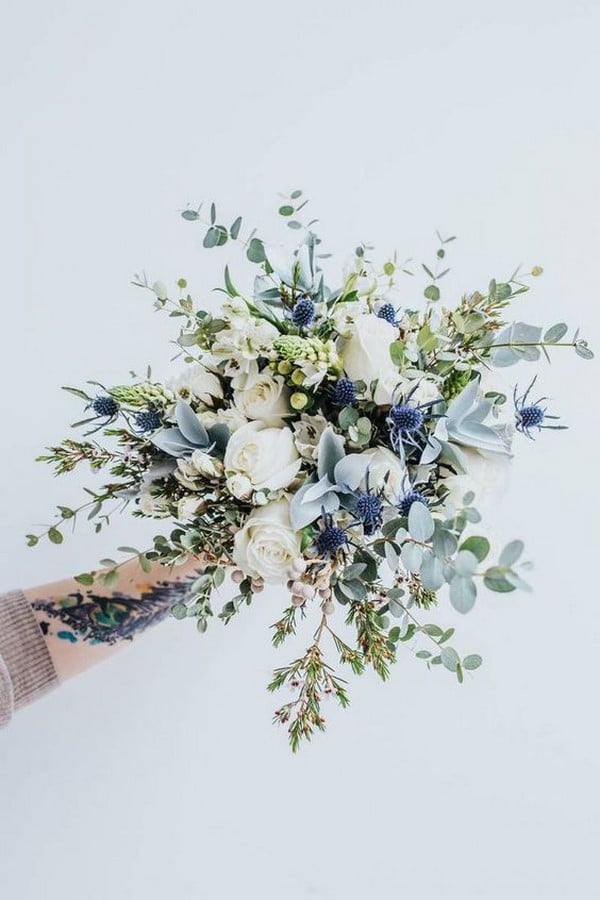 white roses and silver eucalyptus wedding bouquet