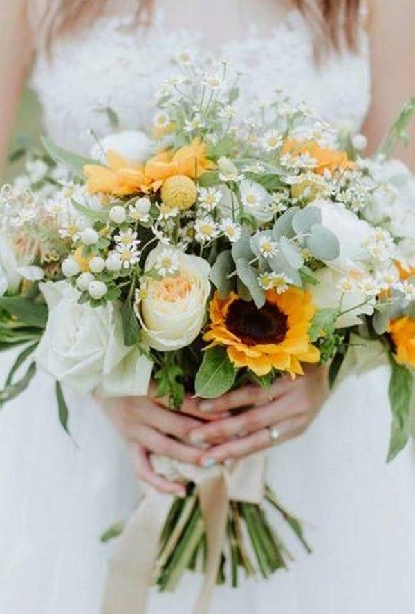 white roses and sunflower wedding bouquet