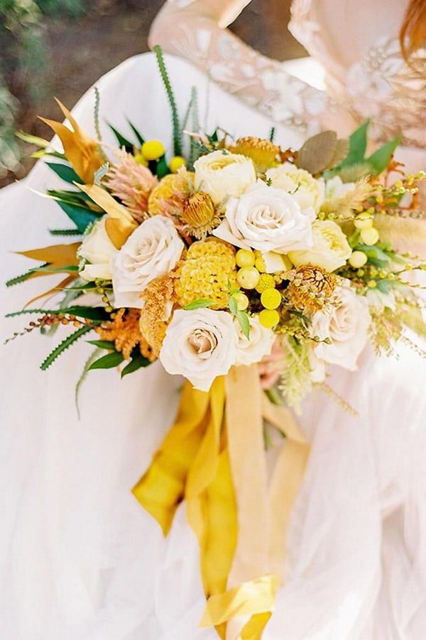 white roses and yellow flowers wedding bouquet