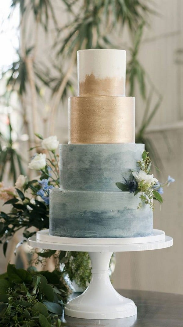 gold and dusty blue wedding cake