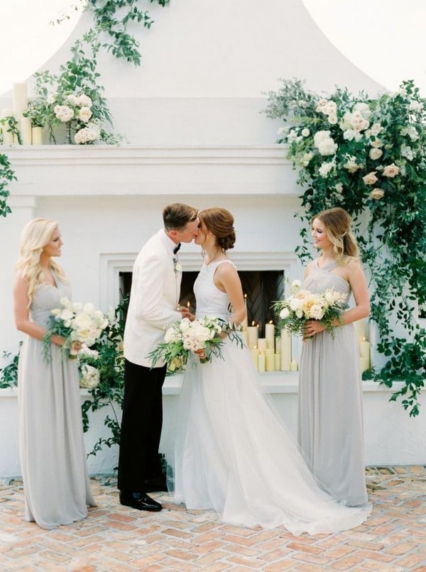 greenery wedding backdrop and grey bridesmaid dresses