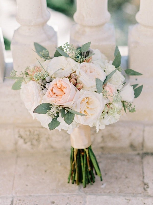 peach roses and seeded eucalyptus wedding bouquet