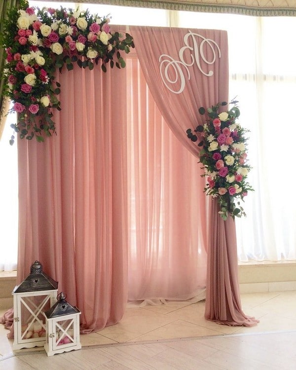 dusty rose indoor wedding arch