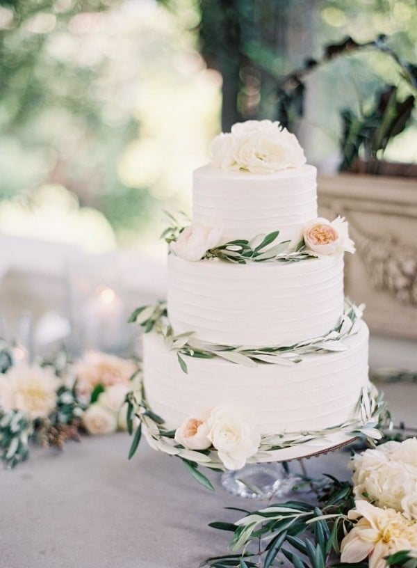 blush roses and greenery buttercream wedding cake