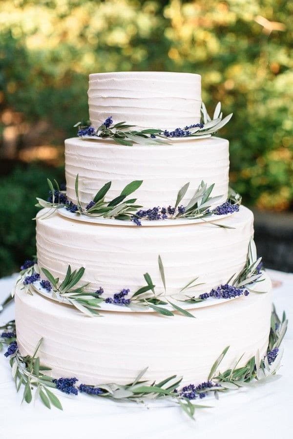 simple greenery and purple wedding cake