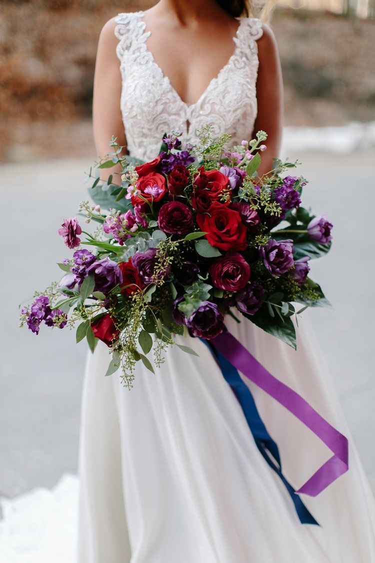 Jewel toned purple and red wedding bouquet