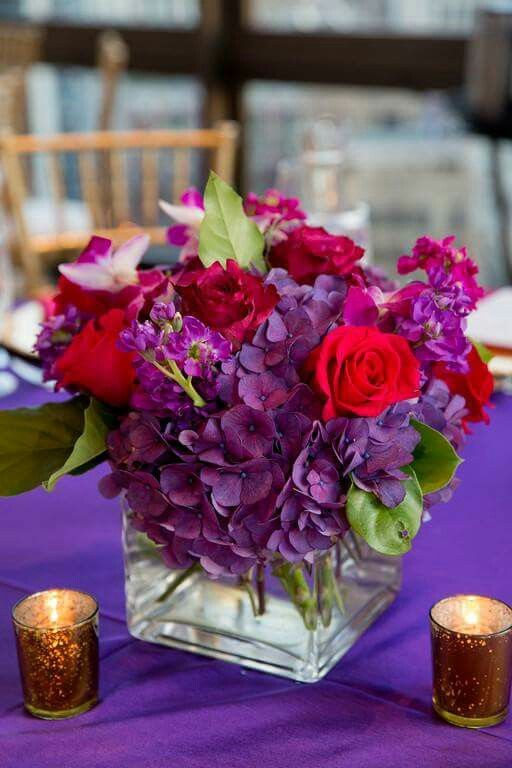 red roses and purple hydrangea wedding centerpiece