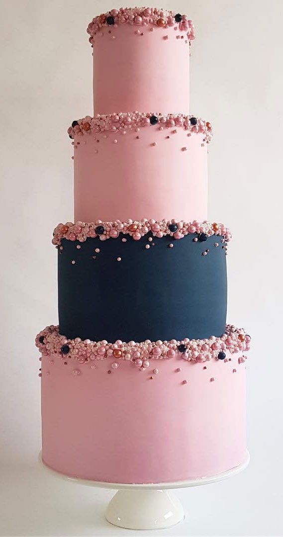 4 tier pink and navy blue wedding cake