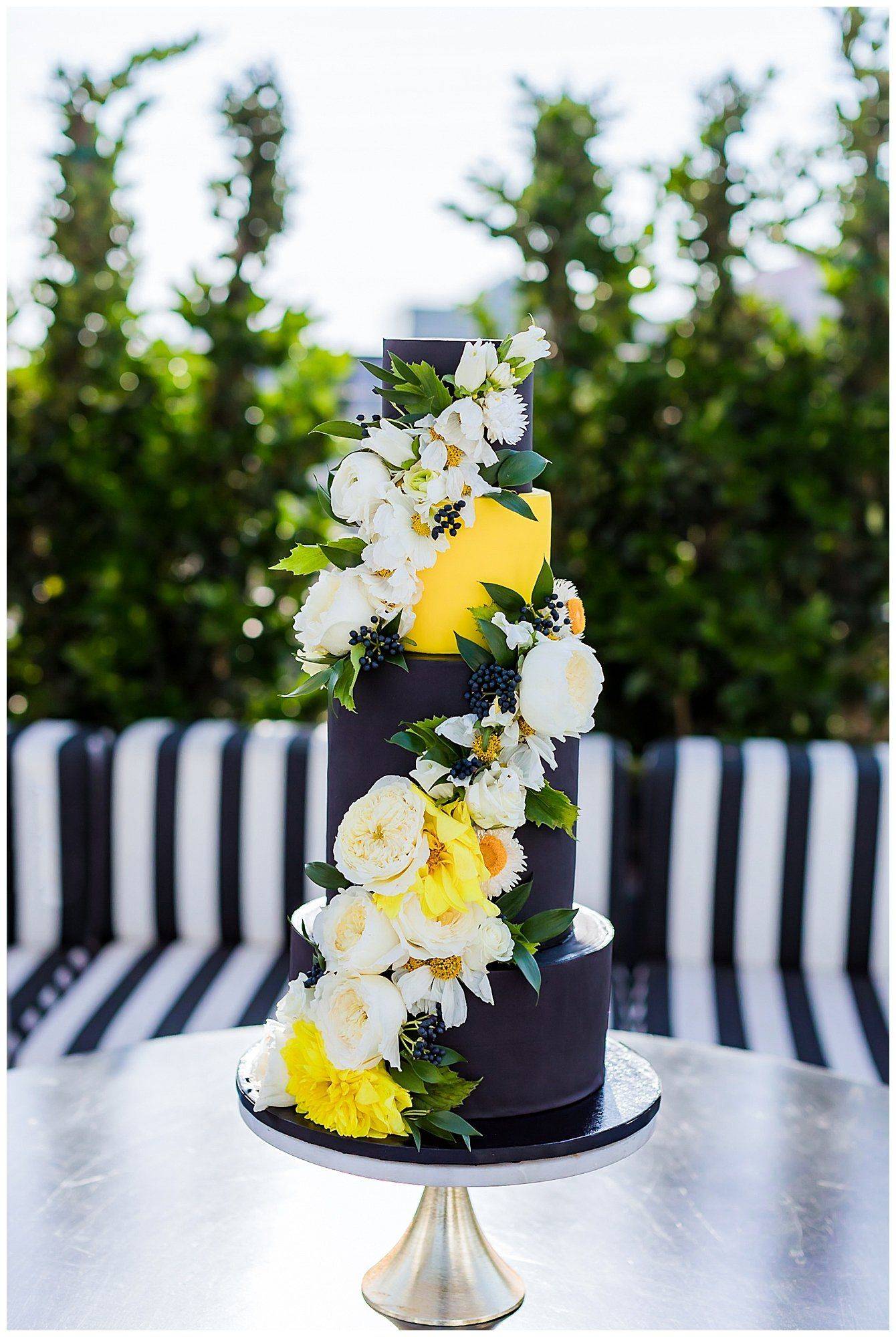 black and yellow wedding cake