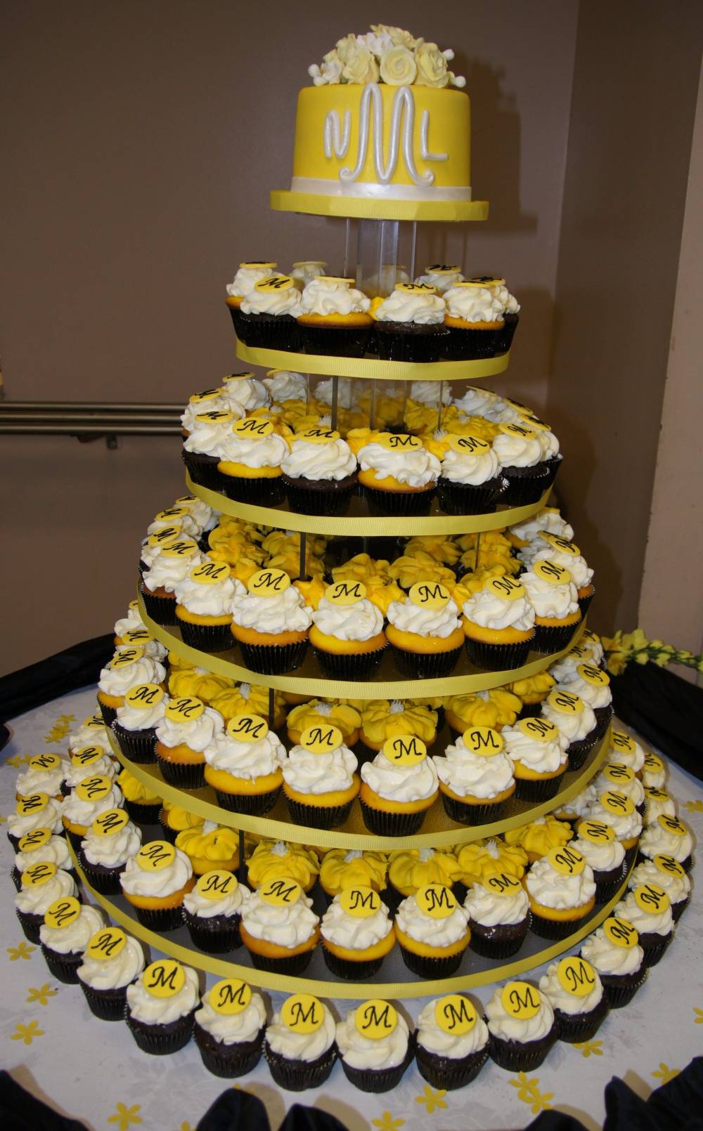 yellow and black Bahamian wedding cake