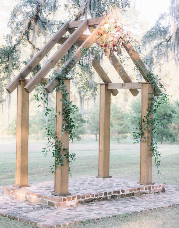 Wooden beams wedding arch
